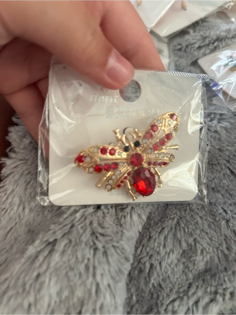 4/$50 Gold Tone Bee Brooch with Red Rhinestones